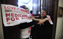 <p>Protesters against the Republic health care proposals block the entrance to the office of Sen. Cory Gardner, R-Colo., at the Russell Senate Office building on Capitol Hill in Washington, Wednesday, July 19, 2017. (Photo: Manuel Balce Ceneta/AP) </p>