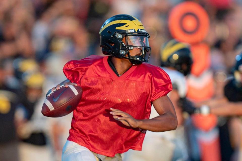 Del Oro High School quarterback Caden Pinnick throws the ball during a scrimmage at Twelve Bridges High School in Lincoln on Friday.