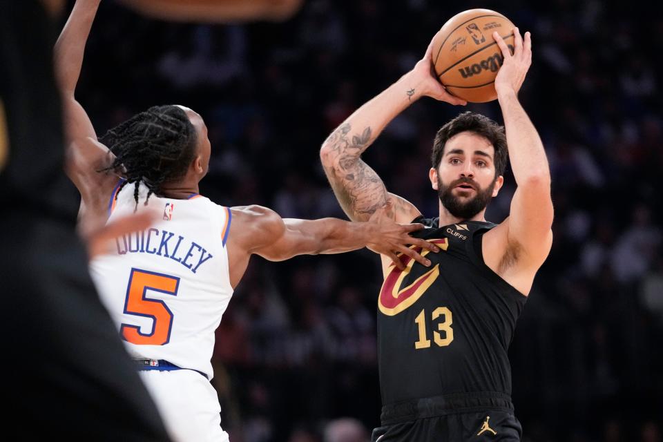 Cavaliers guard Ricky Rubio looks to pass around Knicks guard Immanuel Quickley in Game 4 of a first-round playoff series, April 23, 2023, in New York. Rubio announced Aug. 5, he is taking a break from basketball to focus on his mental health.