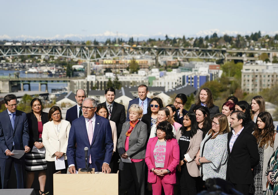 Washington Gov. Jay Inslee speaks before signing several bills aimed at protecting reproductive health and gender-affirming care in Washington, Thursday, April 27, 2023, at the University of Washington's Hans Rosling Center for Population Health in Seattle. (AP Photo/Lindsey Wasson)