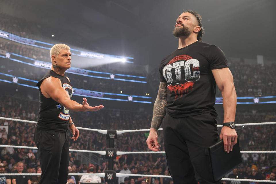 SEATTLE, WASHINGTON - SEPTEMBER 13: Cody Rhodes agrees to partner with Roman Reigns during SmackDown at Climate Pledge Arena on September 13, 2024 in Seattle, Washington.  (Photo by WWE/Getty Images)