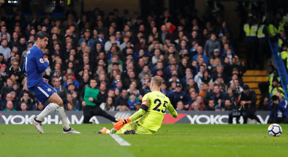 <p>Alvaro Morata nutmegs Joe Hart, but the goal was disallowed </p>