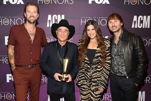 <p>Jason Kempin/Getty</p> Charles Kelley, Hillary Scott and Dave Haywood of Lady A with Clint Black at the ACM Honors in Nashville on Aug. 23, 2023