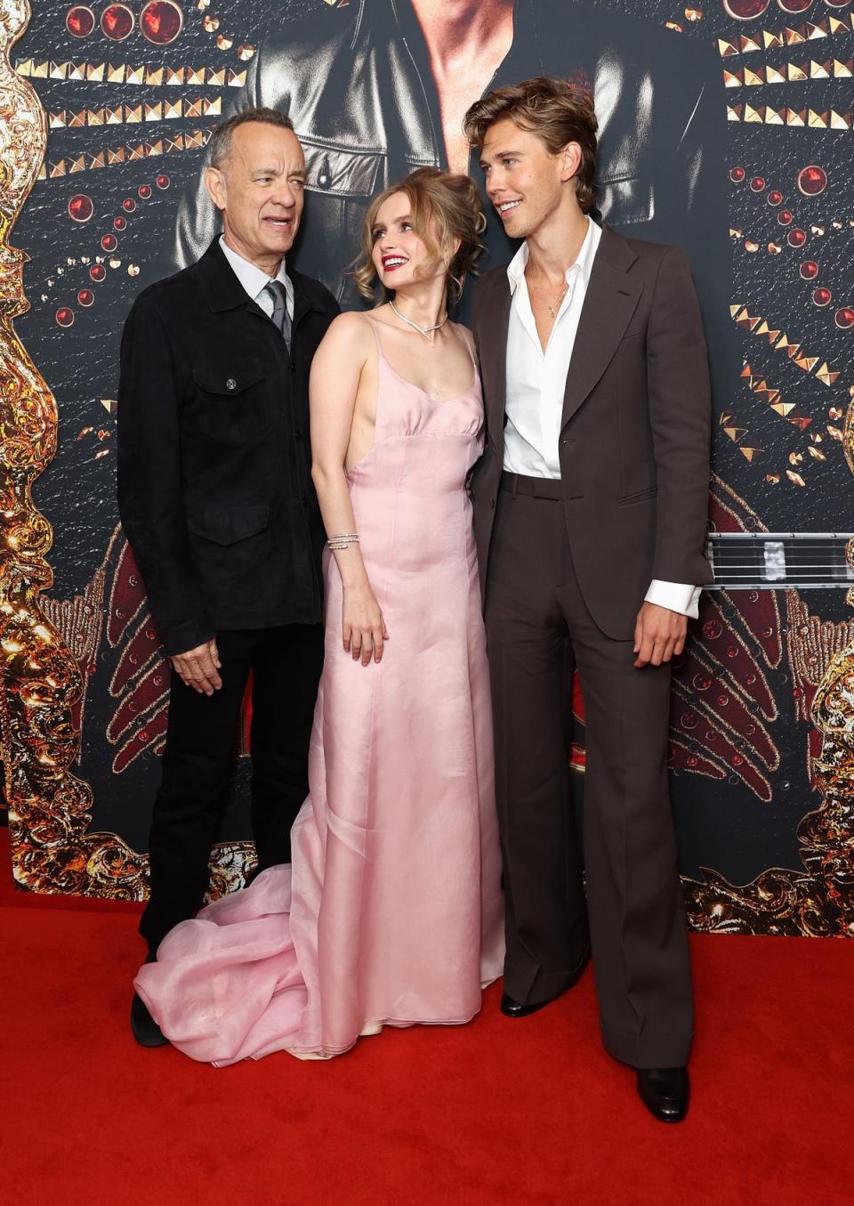 (L-R) Hanks, with Elvis co-stars Olivia DeJonge and Austin Butler, at the Sydney premiere of Elvis in June, was slammed by critics for his performance in the film (Brendon Thorne/Getty Images)