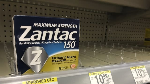 A box of Maximum Strength Zantac tablets at a pharmacy