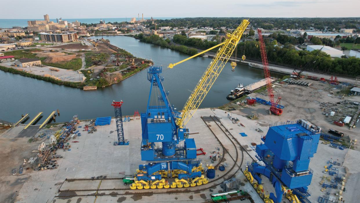 Drone image of two blue cranes being completed at Broadwind Heavy Fabrications in Manitowoc