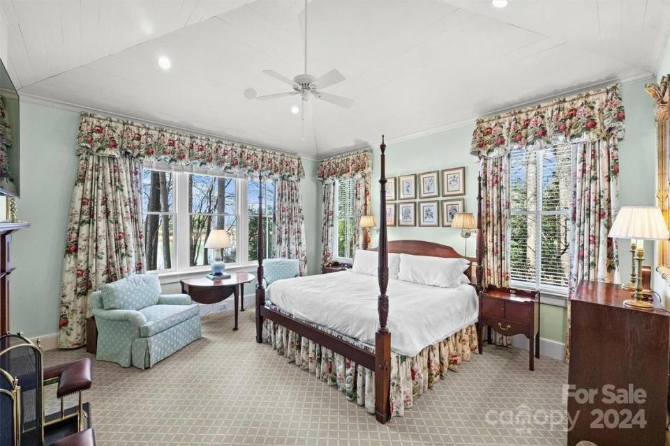 This bedroom in the home at 166 Iron Gate Circle includes lots of natural light.