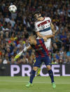 Football - FC Barcelona v Bayern Munich - UEFA Champions League Semi Final First Leg - The Nou Camp, Barcelona, Spain - 6/5/15 Bayern Munich's Robert Lewandowski heads at goal under pressure from Barcelona's Javier Mascherano Reuters / Paul Hanna