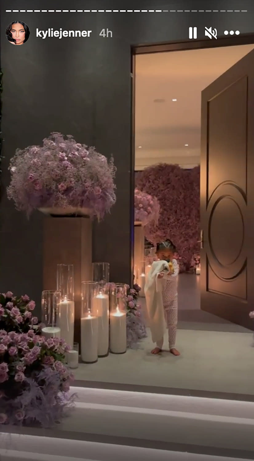 <p>Jenner also filled two more rooms with roses and sunflowers for her beau, arranging them in various heart formations — like this dreamy pink setup. </p>