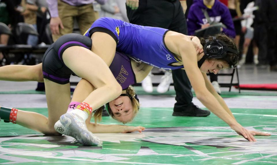 Olivia Anderson of Watertown attempts to break free from Canton's Finley Evjen during their girls' 100-pound championship match in the South Dakota State Individual Wrestling Tournament on Saturday, Feb. 24, 2024 at the Denny Sanford PREMIER Center in Sioux Falls. Finley won by fall.