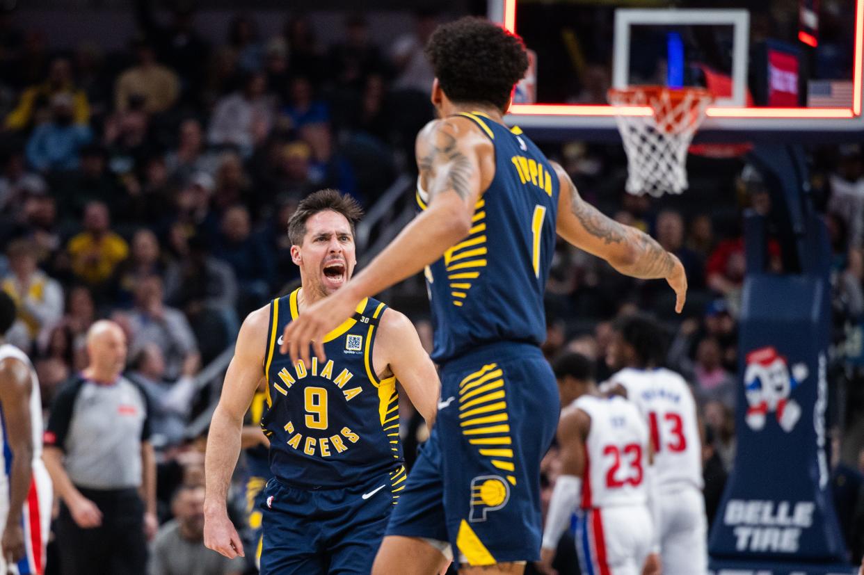 Feb 22, 2024; Indianapolis, Indiana, USA; Indiana Pacers guard T.J. McConnell (9) and forward Obi Toppin (1) celebrate in the first half against the Detroit Pistons at Gainbridge Fieldhouse. Mandatory Credit: Trevor Ruszkowski-USA TODAY Sports