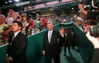 <p>Then-president Bill Clinton walks into the Olympic Stadium during the Opening Ceremony of the 1996 Games in Atlanta. (AP) </p>