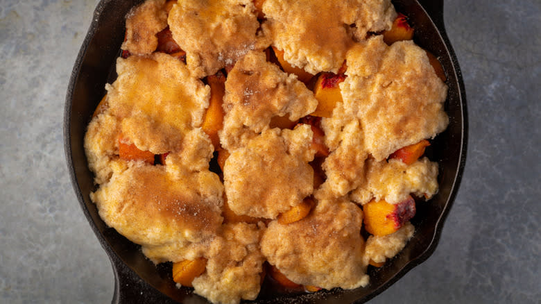 Peach cobbler in cast iron