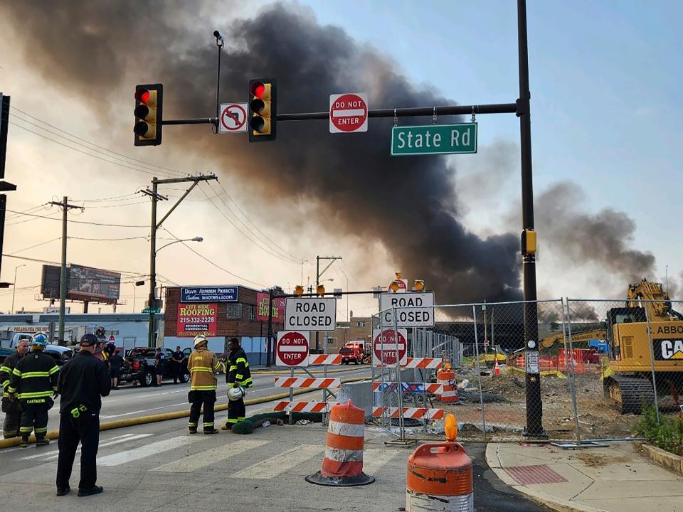 Officials working on the scene following a collapse on I-95