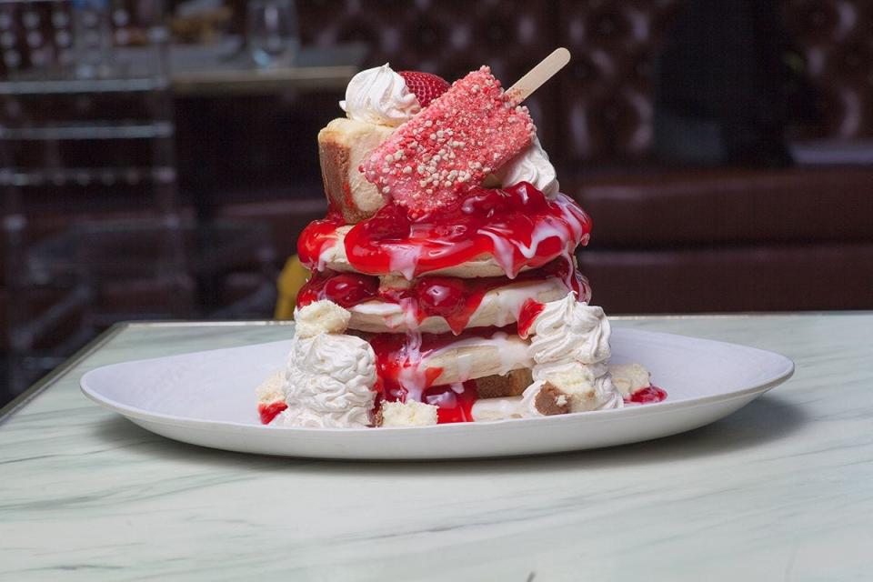 The Sugar Factory at Dover Downs offers a strawberry cheesecake overload pancake stack.