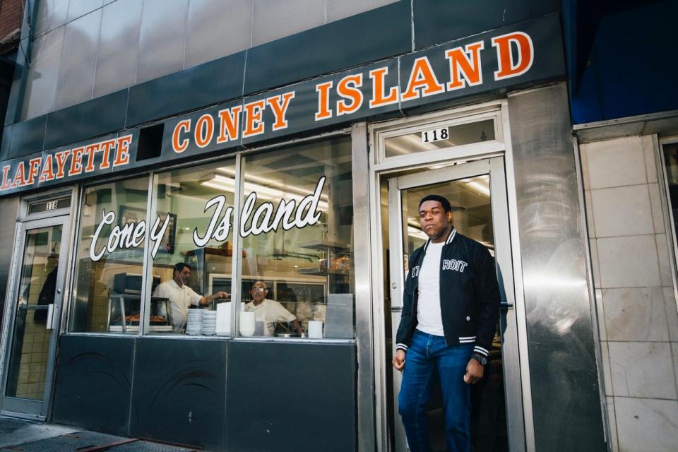 Sam Richardson outside Lafayette Coney Island for a new promotional campaign showcasing Detroit ahead of the NFL draft.
