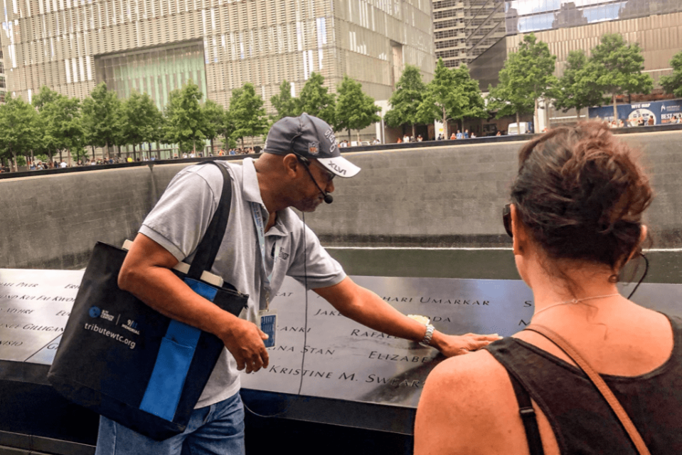 A tour guide at the 9/11 memorial. Priceline partnered with TUI Musement to offer experiences. 9/11 Tribute Museum
