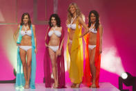 Transgendered contestant Jenna Talackova (2nd R) takes part in Miss Universe Canada competition while wearing her bikini in Toronto May 17, 2012. Talackova was originally disqualified from the Miss Universe Canada contest because she was not a "naturally born female".