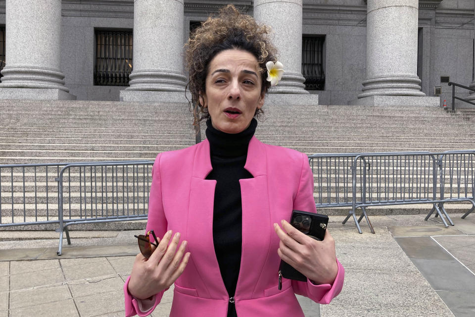 Masih Alinejad, an outspoken U.S.-based opponent of Iran's regime, is interviewed outside Manhattan federal court, Friday, April 7, 2023, in New York, after speaking at the sentencing of a California woman who pleaded guilty to a charge that she had an unwitting role in a foiled plot to kidnap Alinejad and take her back to Tehran. (AP Photo/Lawrence Neumeister)
