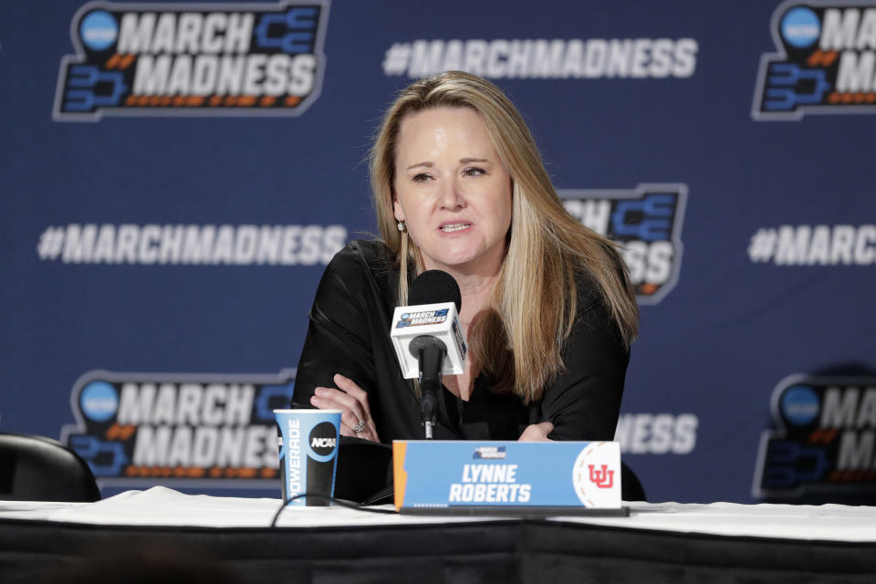FILE - Utah women's head coach Lynne Roberts speaks during a press conference after a second-round college basketball game against Gonzaga in the NCAA Tournament in Spokane, Wash., Monday, March 25, 2024. Police investigating racist incidents directed toward the Utah women's basketball team when they were near their Idaho hotel while in town last month for the NCAA Tournament said in a Wednesday, April 3, post on Facebook, they've found an audio recording, in which the use of a racial slur was clearly audible. (AP Photo/Young Kwak, File)