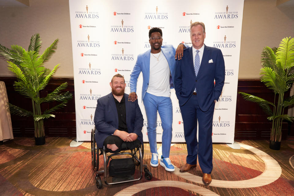 Two Father of the Year Awards 2023 Honorees Tomy Parker and Michael Kay with Master of Ceremonies Nate Burleson.