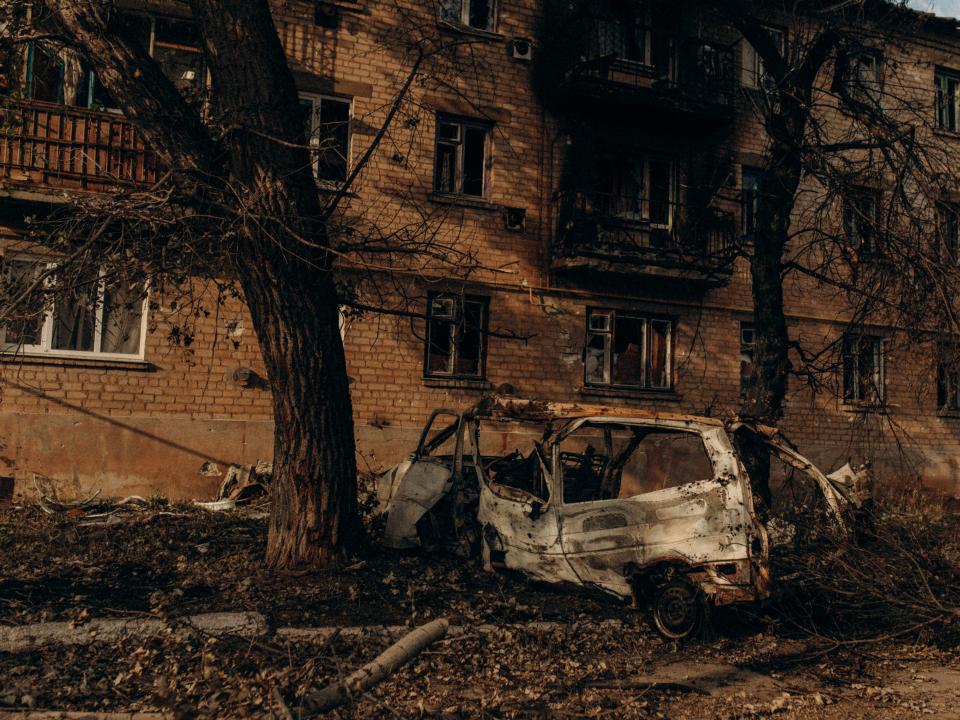 A burned car in the streets of Soledar.