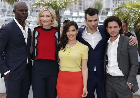 (L-R) Cast members Djimon Hounsou who voices Drago Bludvist character, Cate Blanchett who voices Valka character, America Ferrera who voices Astrid character, Jay Baruchel who voices Hiccup character, and Kit Harington who voices Eret character pose during a photocall for the film "How to Train Your Dragon 2" out of competition at the 67th Cannes Film Festival in Cannes May 16, 2014. REUTERS/Regis Duvignau