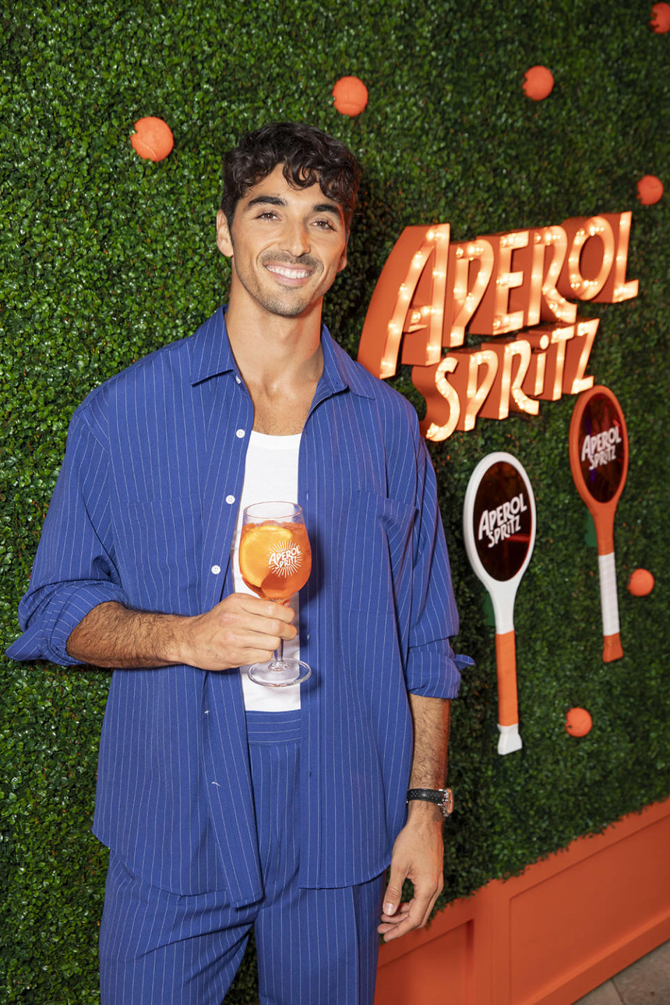 Taylor Zakhar Perez enjoys an Aperol Spritz at Racquet House in NYC