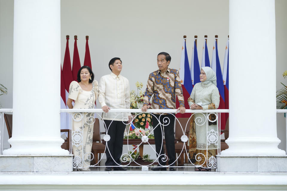 Philippine President Ferdinand Marcos Jr. center left, and his wife Madame Louise Araneta Marcos, left, share a light moment Indonesian President Joko Widodo and his wife Iriana during their meeting at the Presidential Palace in Bogor, Indonesia, Monday, Sept, 5, 2022.(AP Photo/Achmad Ibrahim, Pool)