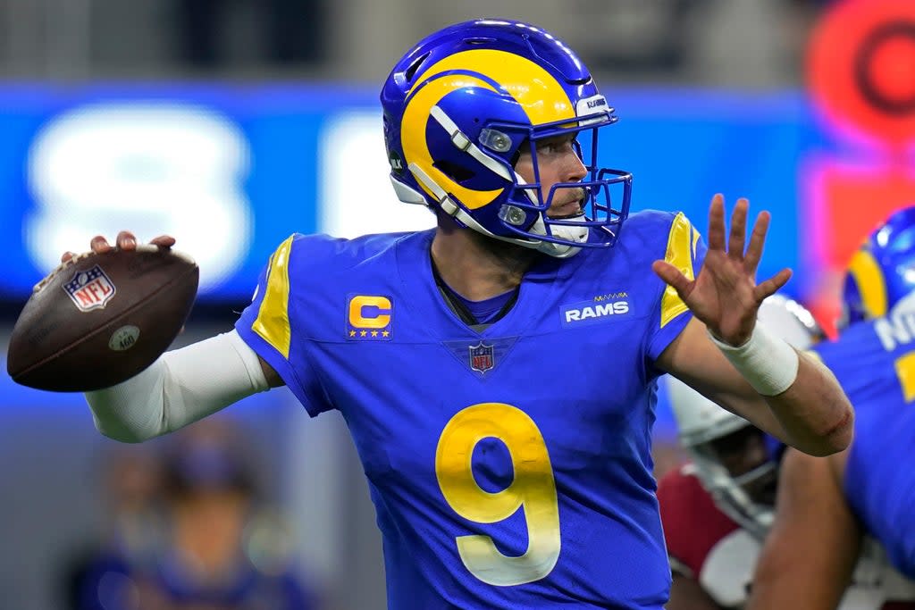 Los Angeles Rams quarterback Matthew Stafford (9) passes against the Arizona Cardinals during the second half of an NFL wild-card playoff football game in Inglewood, Calif., Monday, Jan. 17, 2022. (AP Photo/Jae C. Hong) (AP)