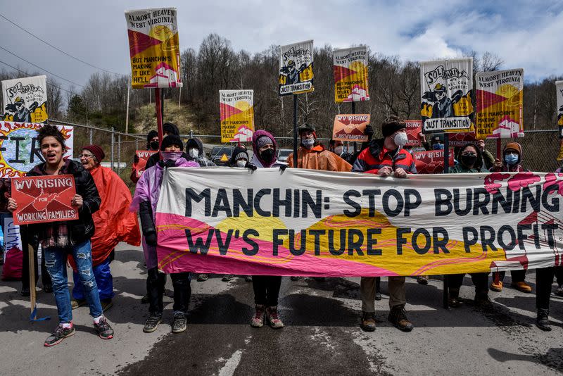 FILE PHOTO: People protest against Senator Manchin in West Virginia