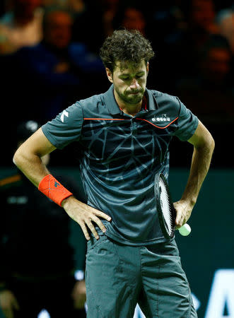 Tennis - ATP 500 - Rotterdam Open - Quarterfinal - Ahoy, Rotterdam, Netherlands - February 16, 2018 Robin Haase of the Netherlands reacts during his match against Roger Federer of Switzerland. REUTERS/Michael Kooren