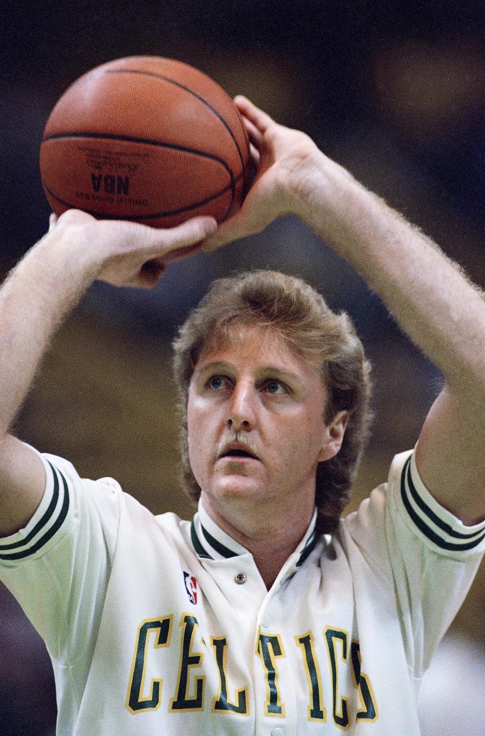 Larry Bird of the Boston Celtics, in Boston at night, Wednesday, Jan. 15, 1987 during warm-ups prior to NBA game against Dallas, was named on Thursday as The Associated Press Male Athlete of the Year. (AP Photo/Paul Benoit)