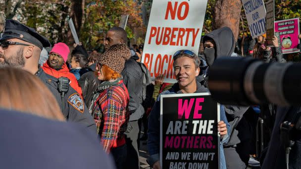 PHOTO: Supporters of Kellie-Jay Keen and trans-exclusionary radical feminist members are met by counter protestors outside City Hall. The British author has been on a nationwide speaking tour, in which New York was her final stop, Nov. 14, 2022. (Derek French/Shutterstock)