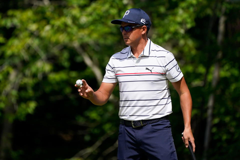 Rickie Fowler reacts after a shot on the 11th hole during the second round of the Travelers Championship golf tournament at TPC River Highlands, Friday, June 24, 2022, in Cromwell, Conn. (AP Photo/Seth Wenig)