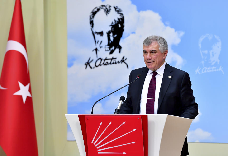 Unal Cevikoz, deputy chairman of Turkey's main opposition Republican People's Party, CHP, speaks to the media after a meeting with Foreign Minister Mevlut Cavusoglu, in Ankara, Turkey, Monday, Dec. 30, 2019. The CHP said Monday it does not support the government's plans to deploy troops to Libya, saying the move would embroil Turkey in another conflict and make it a party to the "shedding of Muslims." (AP Photo)