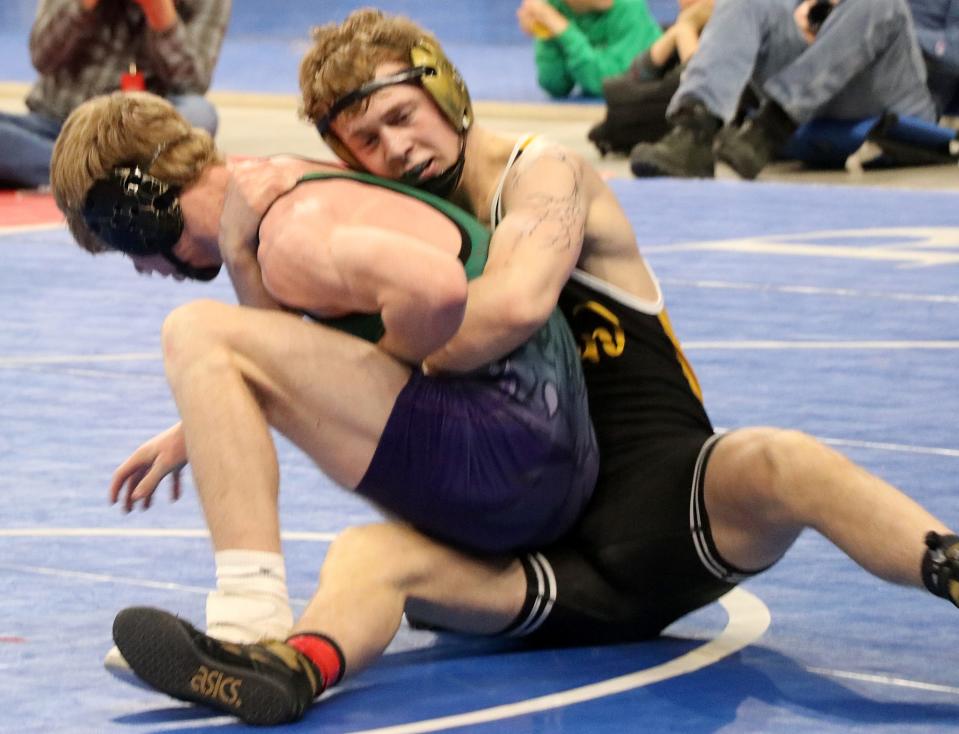 Canton's Ayson Rice (right) defeated Carter Lenz of Kimball-White Lake/Platte-Geddes during the Class B 145-pound championship on Saturday, Feb. 24, 2023 in the South Dakota State Wrestling Championships at The Monument in Rapid City.
