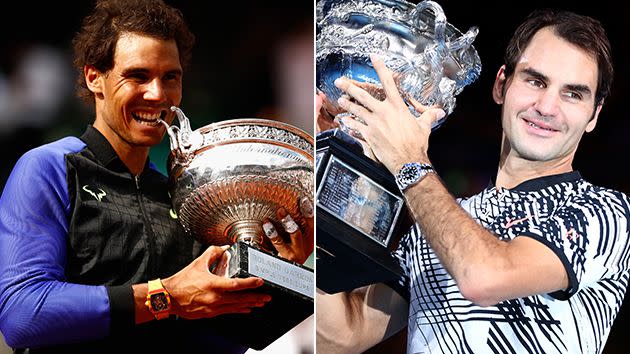 Nadal and Federer with their 2017 grand slam trophies. Image: Getty