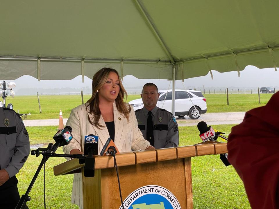 Kayla McLaughlin, director of communications at the Florida Department of Corrections, briefs the media hours ahead of the Duane Owen execution. She was across the street from the Florida State Prison campus where Owen and other prisoners are housed.