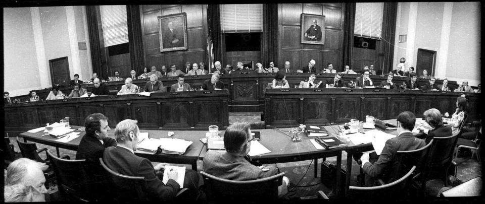 <p>The hearing room of the House Judiciary Committee, July 25, 1974, as the panel began another day of debate on the impeachment question. The members of the committee are seated with Chairman Peter Rodino, D-N.J., in the center of the back row. (Photo: AP) </p>