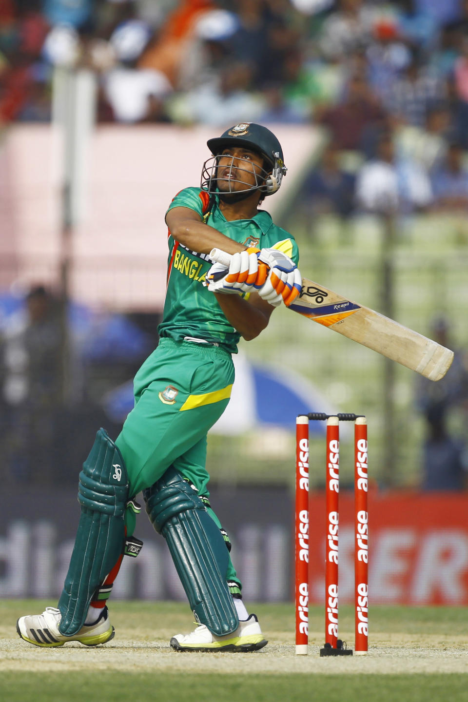 Bangladesh's Anamul Haque plays a shot during the Asia Cup one-day international cricket tournament against India in Fatullah, near Dhaka, Bangladesh, Wednesday, Feb. 26, 2014. (AP Photo/A.M. Ahad)