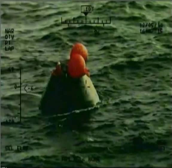 Orion capsule sits in the Pacific Ocean following splashdown, the conculsion of its first uncrewed test flight on Dec. 5, 2014.