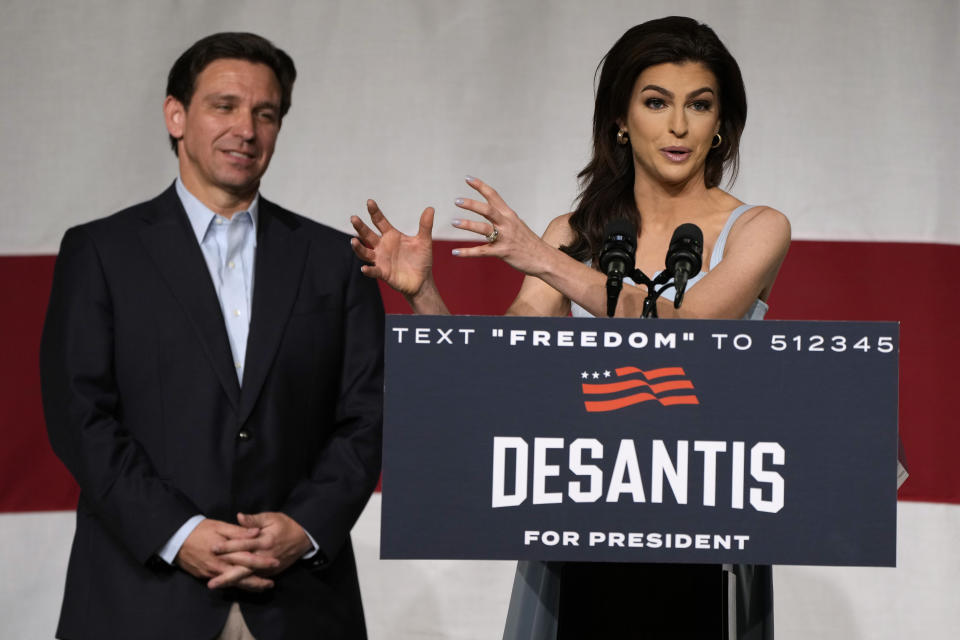 Republican presidential candidate Florida Gov. Ron DeSantis listens to his wife Casey speak during a campaign event, Tuesday, May 30, 2023, in Clive, Iowa. (AP Photo/Charlie Neibergall)