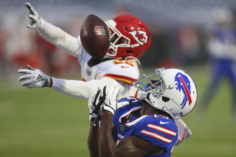 Kansas City Chiefs safety Juan Thornhill (22) breaks up a pass to Buffalo Bills' John Brown (15) during the first half of an NFL football game, Monday, Oct. 19, 2020, in Orchard Park, N.Y. (AP Photo/Jeffrey T. Barnes)