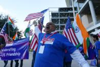 People celebrate before a "Howdy, Modi" rally celebrating India's Prime Minister Narenda Modi at NRG Stadium in Houston