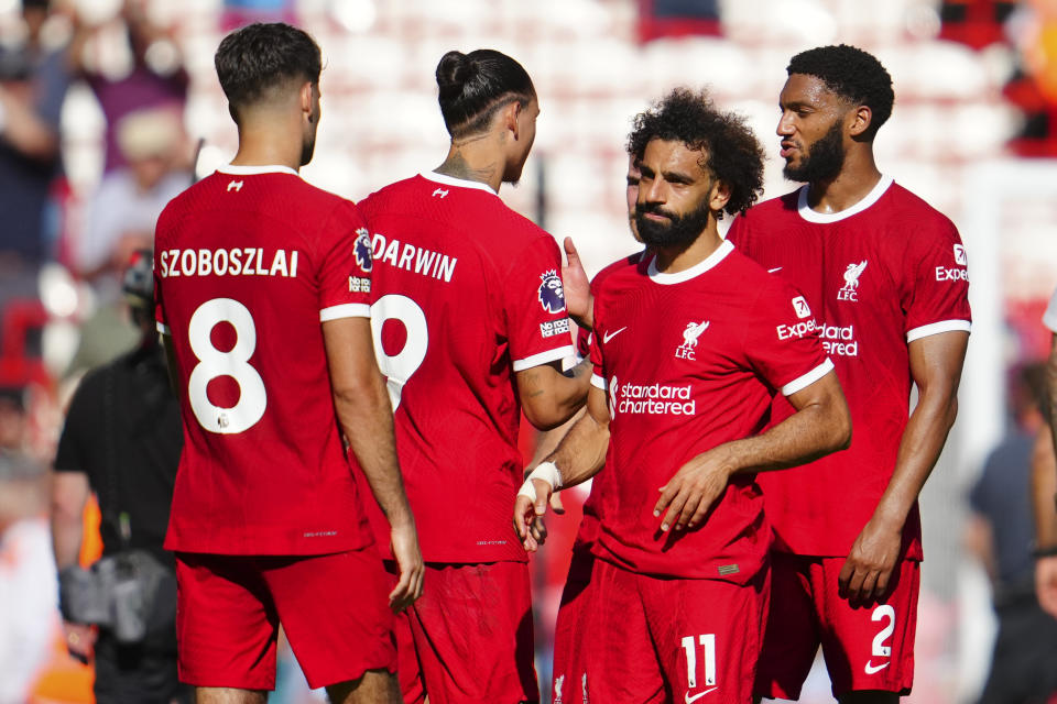 Liverpool's Mohamed Salah grimaces after the English Premier League soccer match between Liverpool and Aston Villa at Anfield stadium in Liverpool, Sunday, Sept. 3, 2023. (AP Photo/Jon Super)