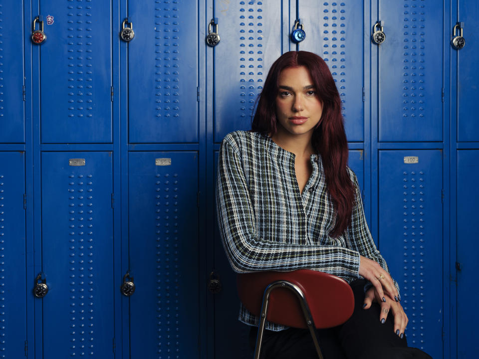 Dua Lipa poses for a portrait to promote her new album "Radical Optimism" on Friday, April 26, 2024, in New York. (Photo by Drew Gurian/Invision/AP)