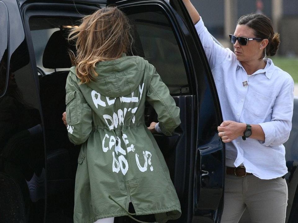 The back of Melania Trump's green jacket reads "I really don't care, do u?" in graffiti writing.