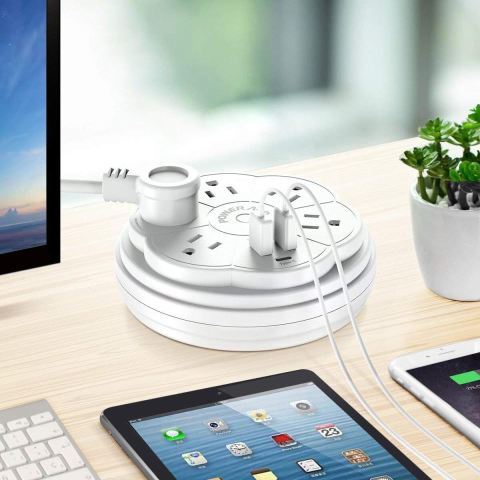 <a href="https://amzn.to/3d3EwNA" target="_blank" rel="noopener noreferrer">This power strip</a>&nbsp;can stay right on your desk -- and your Apple devices won't have to fight over charging spots. It has an outlet extender, too. If you lost your USB charger heads, you're in luck: You can just plug your device in here. And it helps that this power strip looks like a daisy, too. <a href="https://amzn.to/3d3EwNA" target="_blank" rel="noopener noreferrer">Find it for $25 at Amazon</a>.