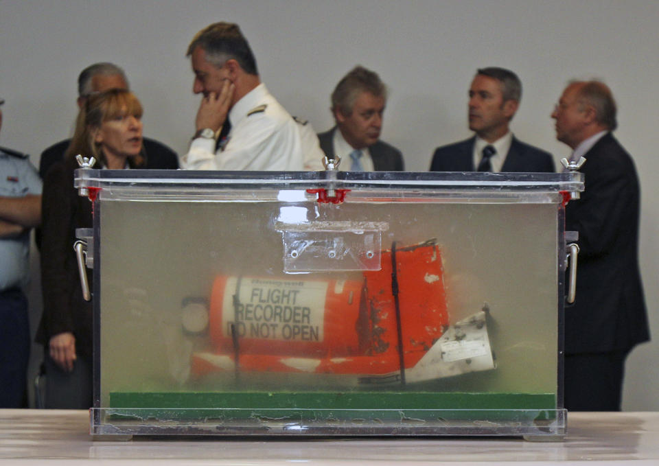 FILE - One of the two flight recorders of the Air France flight 447, that crashed in 2009, is displayed to reporters during a press conference at the French investigators' headquarters in Le Bourget, near Paris, May 12, 2011. It was the worst plane crash in Air France history, killing people of 33 nationalities and having lasting impact. It led to changes in air safety regulations, how pilots are trained and the use of airspeed sensors. (AP Photo/Michel Euler, File)